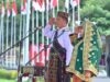 Pakai Baju Adat Manggarai Saat Upacara HUT RI ke-81, Gubernur Miq Iqbal Usap Air Mata Anak Korban Bencana NTT